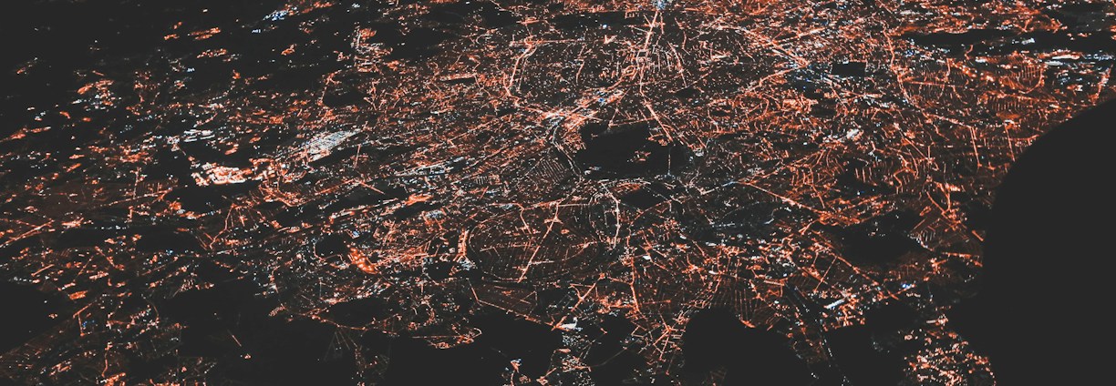 A connected city illuminated at night